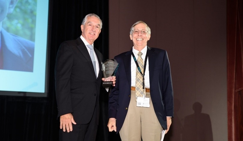 Premier Die Casting President Leonard Cordaro presents the 2017 Doehler Award to John Walker, CEO of Walker Die Casting